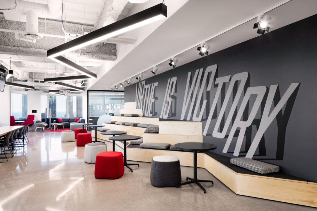 canadian-olympic-committee-image-3 A large wall with staircase seating and tables