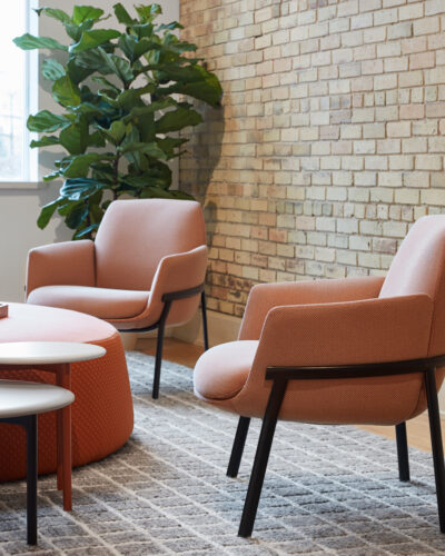 collection-inspiration Two arm chairs facing a large circular table