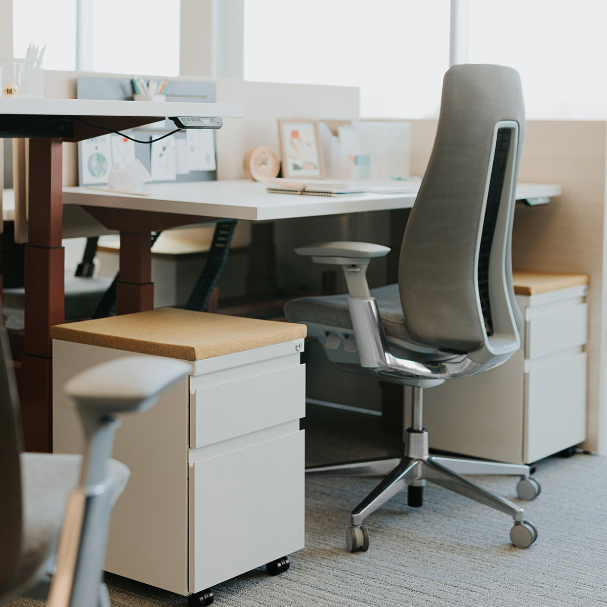 furniture-solutions-section Office chair at a desk with two small filing cabinets