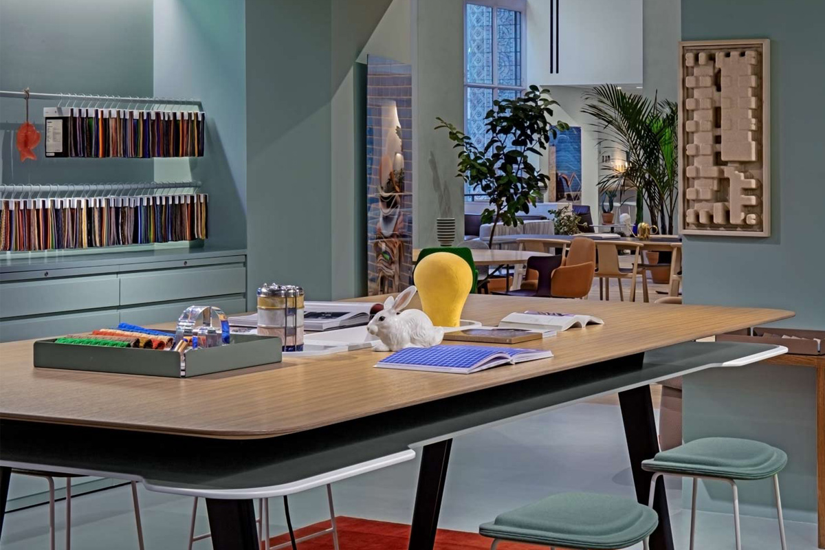 inspired-design Table with notebooks and samples on it