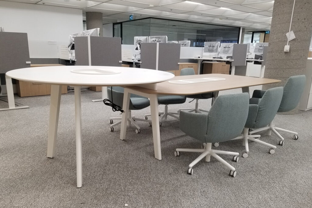 opg-image-4 Standing table connected to a regular table with several chairs